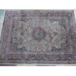 A cream ground rug 140cm x 100cm