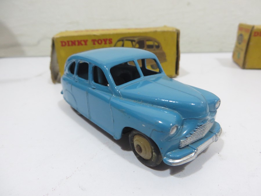 Two boxed Dinky Toys diecast car models, an Austin Devon Saloon (152) 40D and a Standard Vanguard - Image 11 of 16