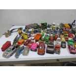 A large quantity of various die cast cars, toys, models etc