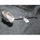 A hallmarked silver toddy/punch ladle, dated 1768