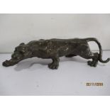 A bronze figure of a stalking panther, overall 38.5cm length
