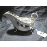 A hallmarked silver sauce boat, 164.1 g