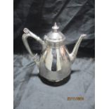 A hallmarked silver coffee pot engraved with dedication to Rev'd Robert Tomes M.A from his