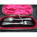 A cased set of hallmarked silver fork and spoon