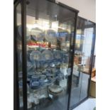 A black two door display cabinet