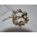 A 9 ct gold and seed pearl brooch