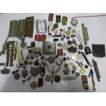 A collection of military buttons, badges, cigarette case, sovereign case, medallions etc