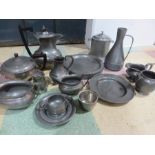 A collection of pewter items