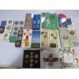 A collection of coins to include uncirculated coins,crown, commemorative coins, silver proof coins