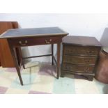 A leather topped side table with single drawer and a small serpentine chest of three drawers