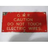 A red enamelled "G.W.R caution do not touch electric wires" sign