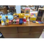A vintage Sindy doll and collection of mainly boxed furniture including hair dryer, rocker, bed,