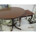 A Regency style round table along with a small side table on cabriole legs