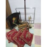 A towel rail, cushions, fire irons fire screen, magazine rack etc.