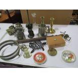 A collection of miscellaneous items including brass candlesticks, bookends, metalware etc.