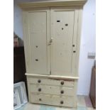 An antique painted pine linen press