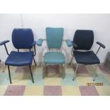 Three industrial style "salon" chairs, one with spring loaded back rest