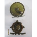 A small brass Hendryx poacher’s fishing reel, patent July 10th 1888 along with one other