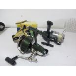 A boxed Olypmic Spark (No.3120) reel, Redwolf RD 503 reel and a Ryobi 233 reel