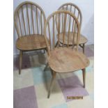 A set of three Ercol stick back chairs ( label to one)