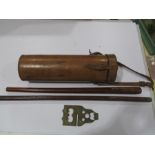 A tan leather round case along with two swagger sticks and a "New Pioneer equipment protector"