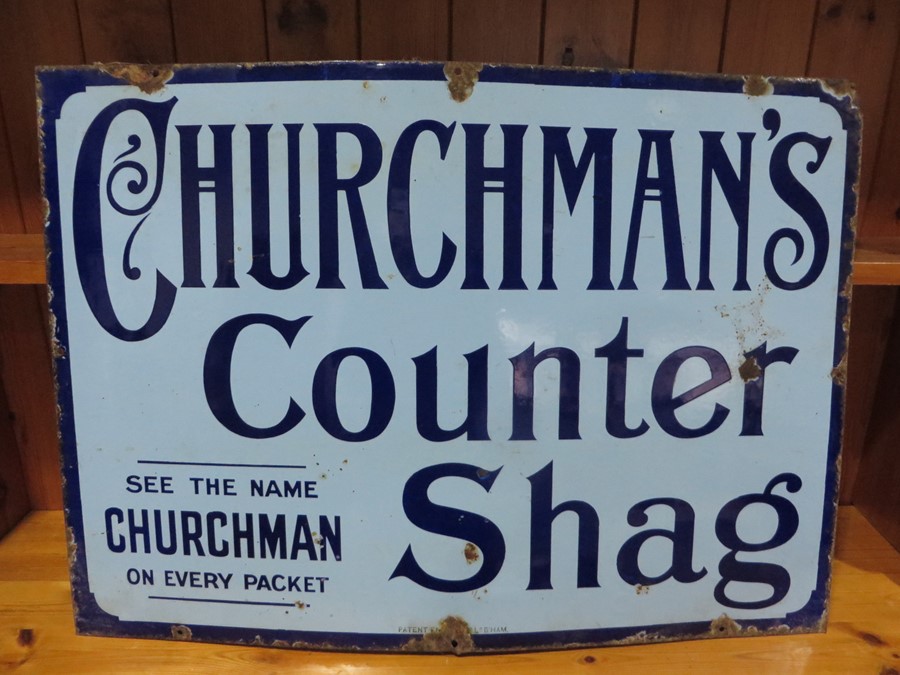 A Churchman's Counter Shag enamelled sign "See The Name Churchman On Every Packet" - 71cm x 51cm