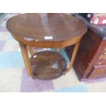 An Art Deco round coffee table