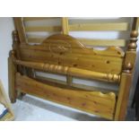 A pine double bed