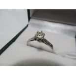 A platinum diamond solitaire, the stone measuring approx 0.20ct