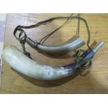 Two cow horn hunting horns