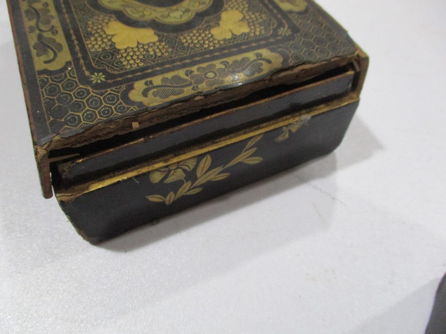A parquetry tea caddy along with a pair of papermache games counter boxes with gilded decoration, - Image 9 of 13
