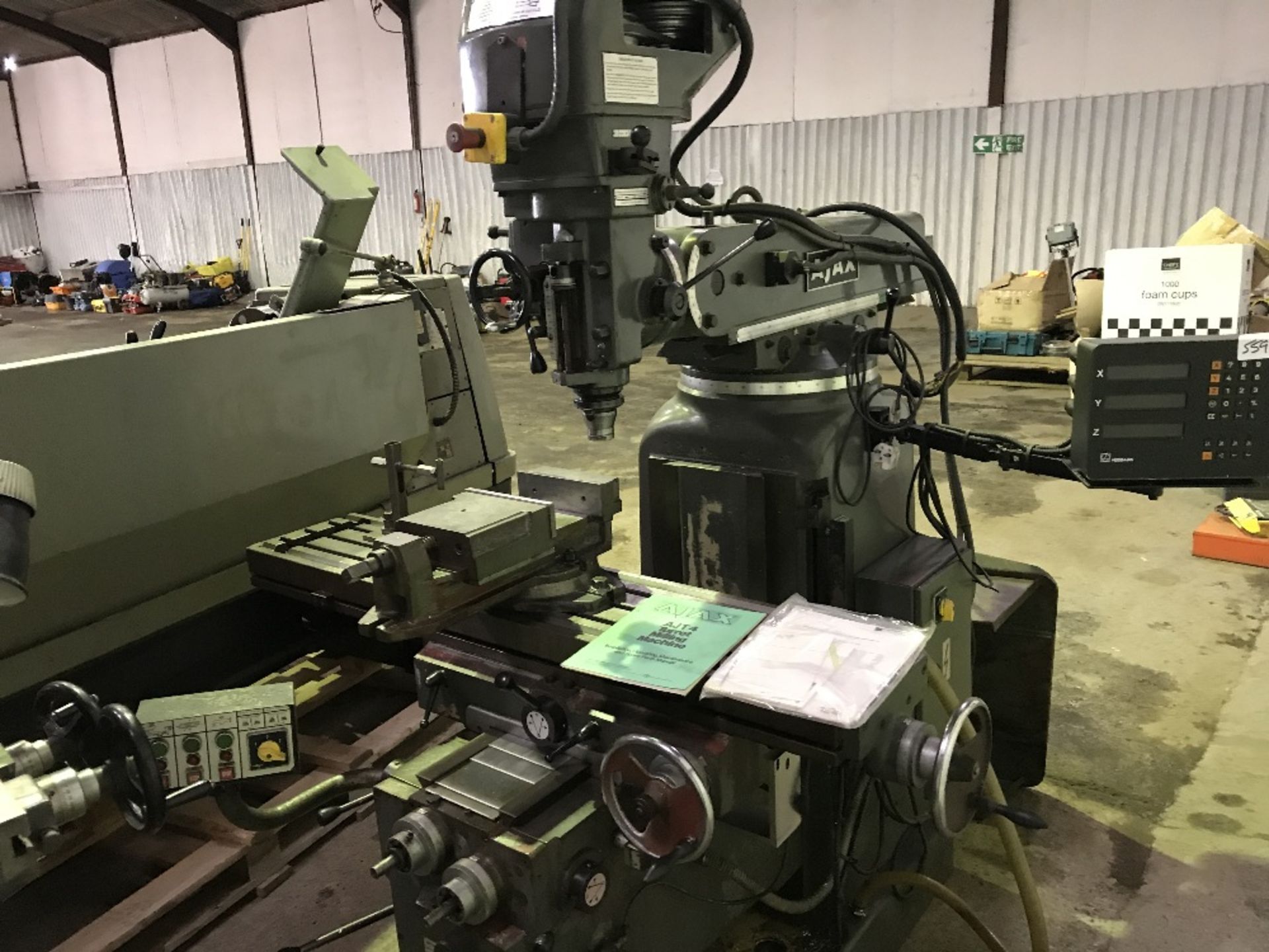 AJAX TURRET MILLING MACHINE WITH HEIDENHAIN XYZ CONTROL UNIT SN: 30438B46252 Sourced directly from a