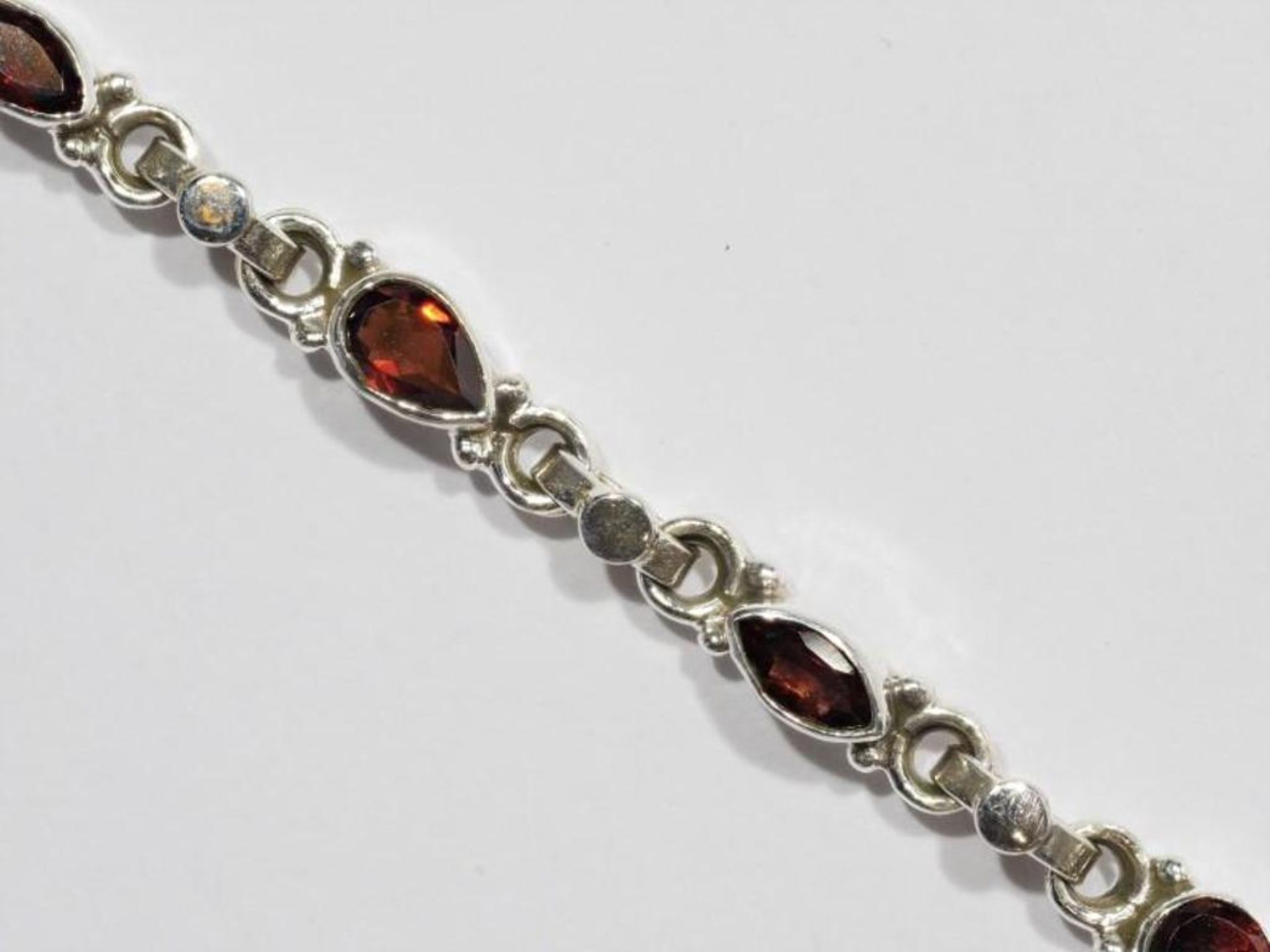 Sterling Silver 11 Garnet Bracelet. Retail $300