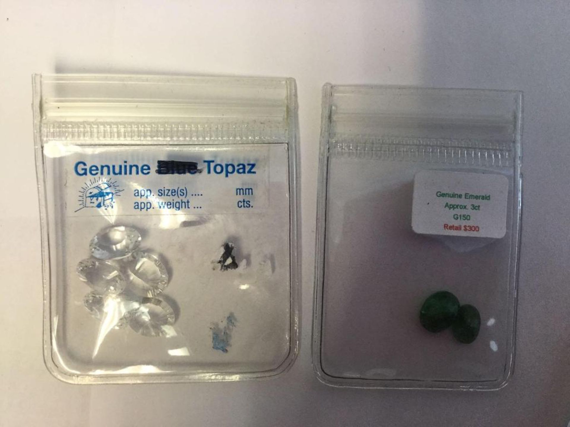 Lot of 2 - 1 xGenuine Topaz Stones and 1 x Genuine Emeralds