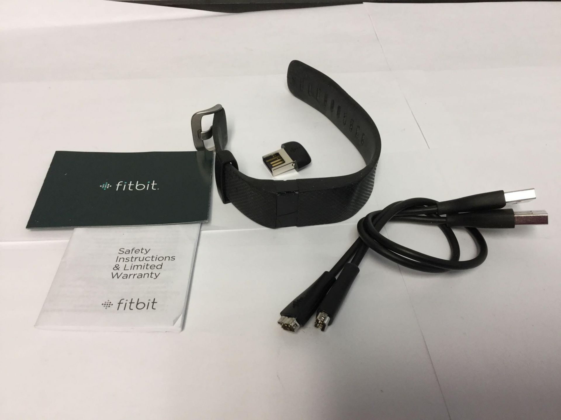 Fit Bit HR with Charging cords and Toggle