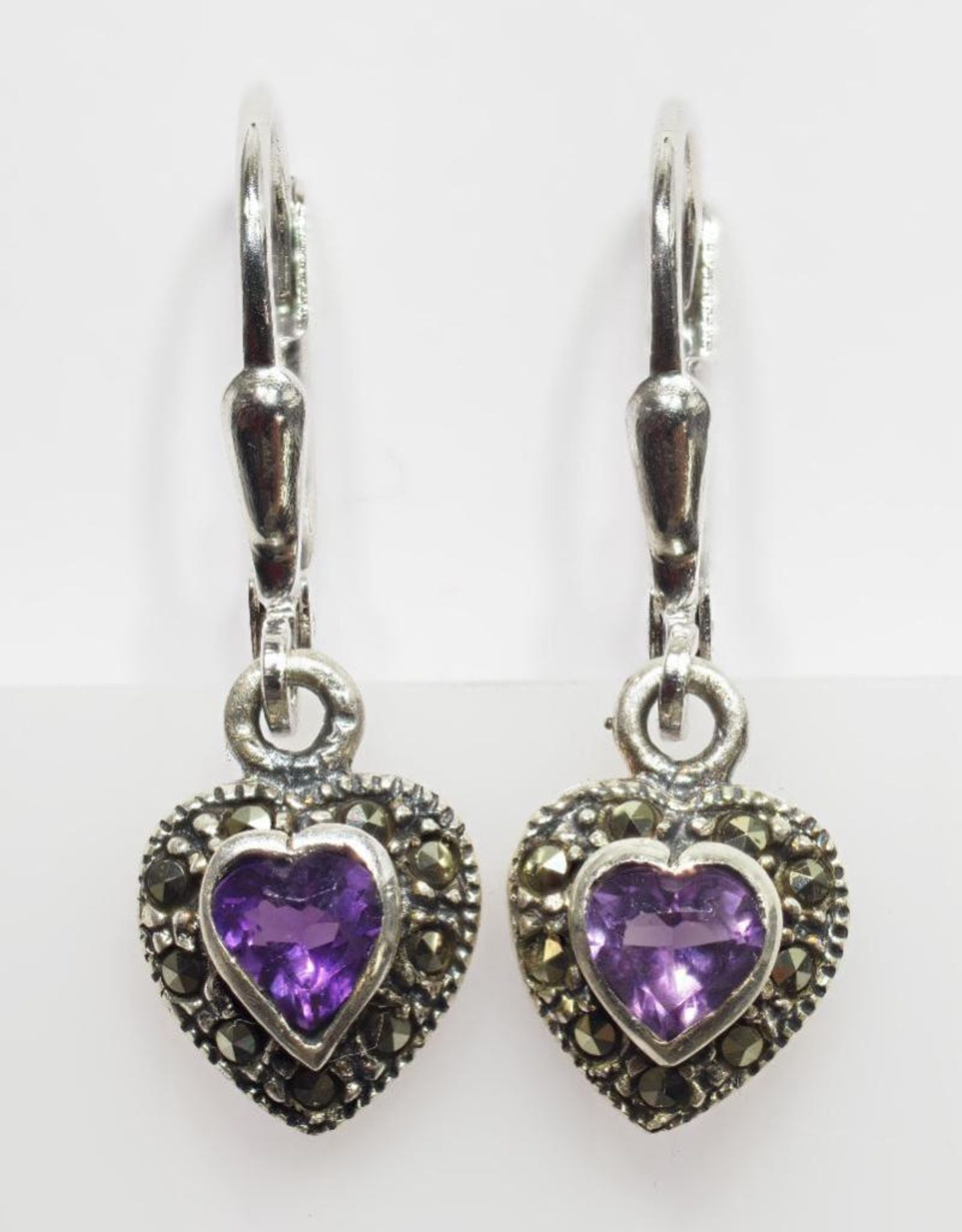 Sterling Silver Amethyst Marcasite Heart Shaped Lever Back Earring. Retail $120