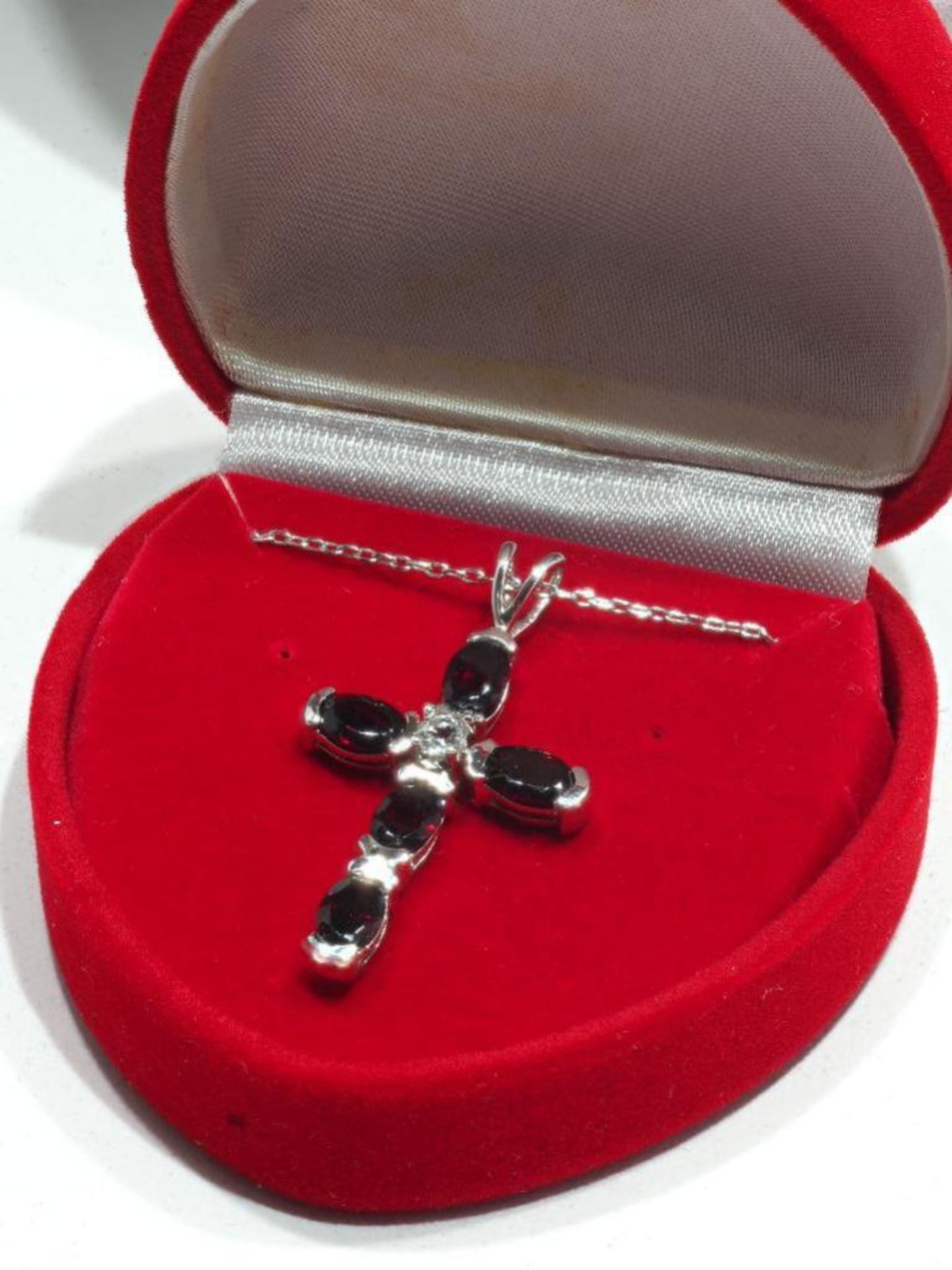 Sterling Silver Genuine Garnet (January Birthstone) Cross Pendant with Chain. Retail $300 - Image 2 of 2