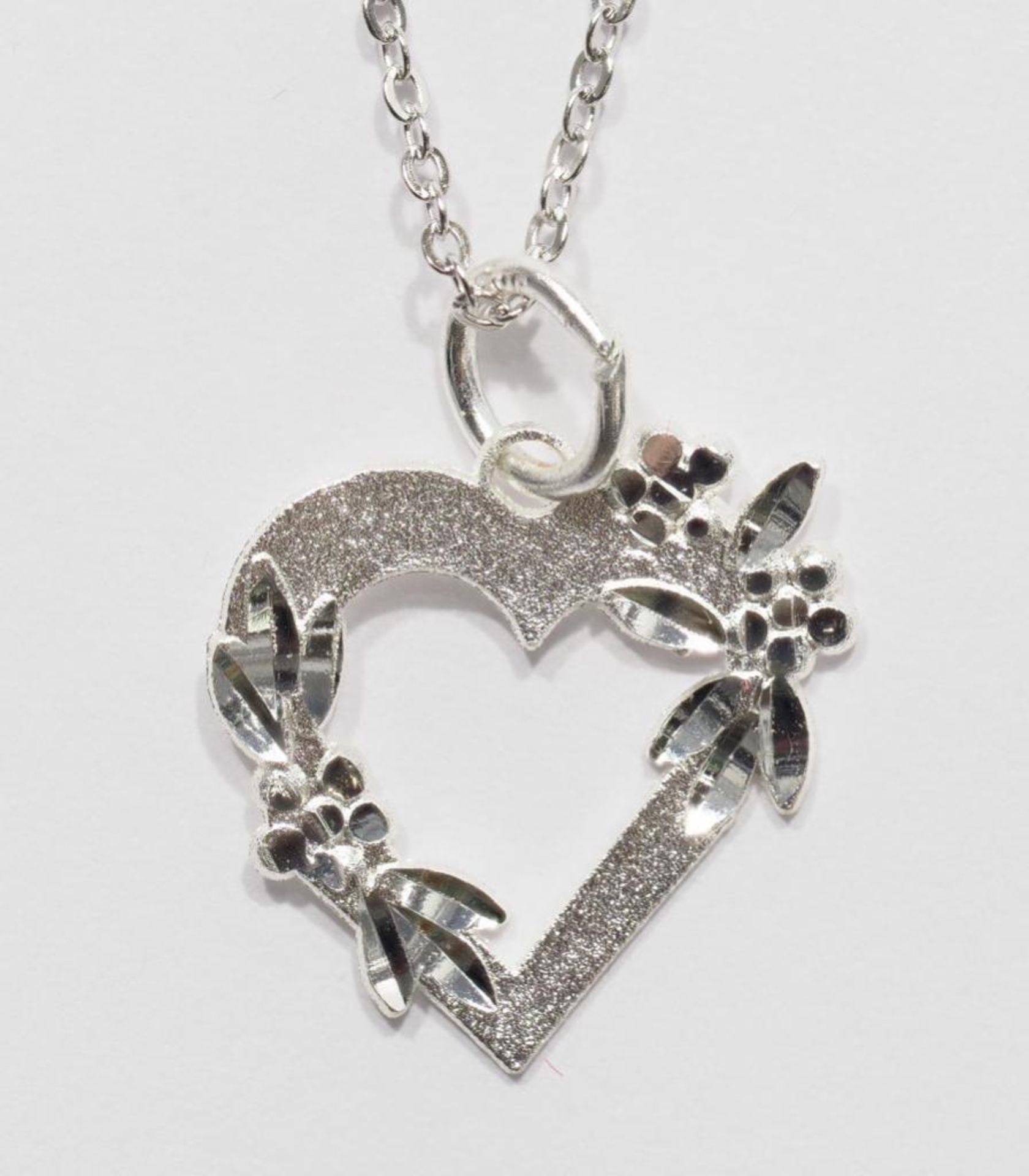 Sterling Silver Heart Shaped Pendant Necklace. Retail $120