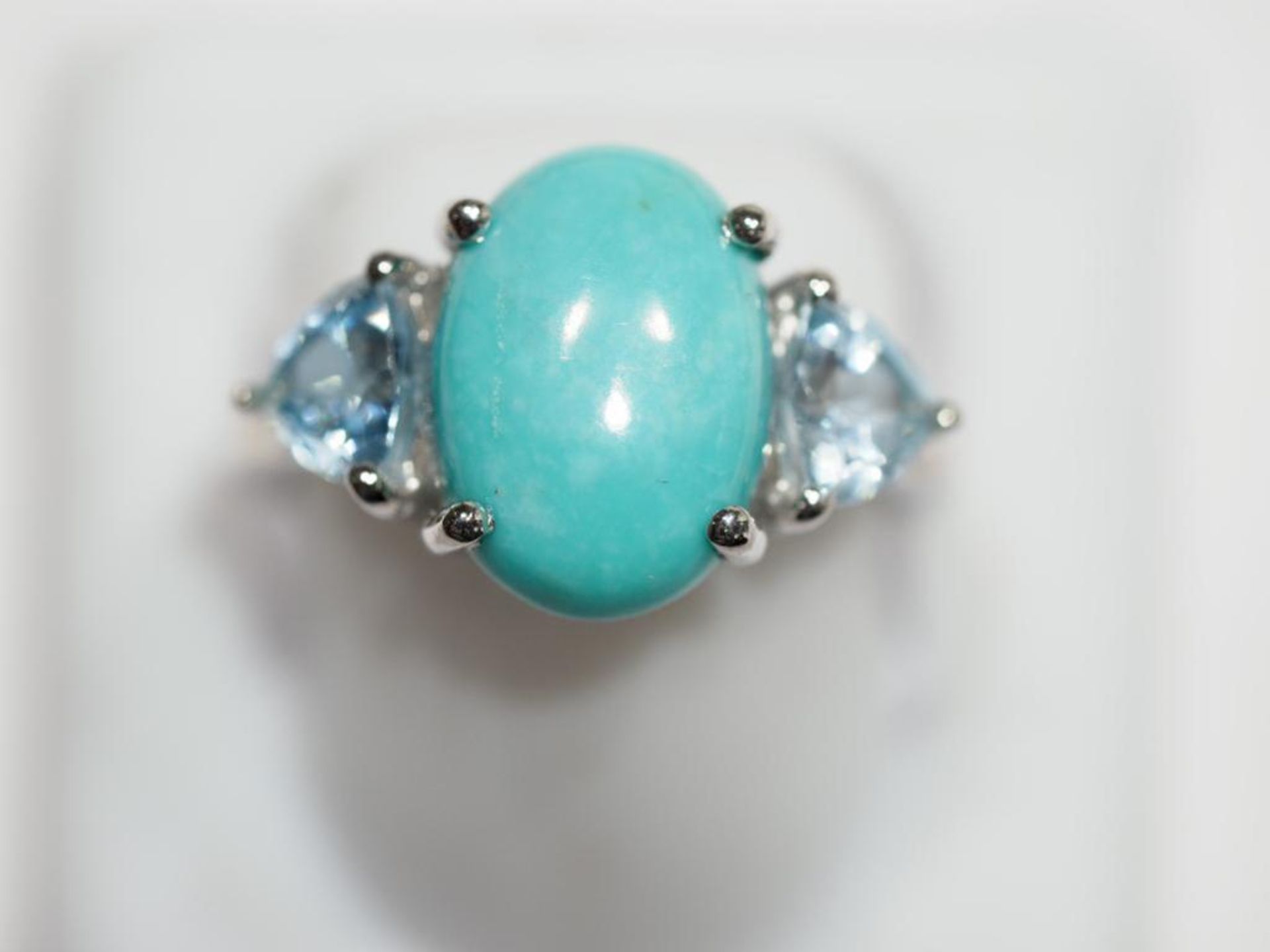 Sterling Silver Arizona Turquoise (Sleeping Beauty) with 2 Trillion Cut Blue Topaz Ring. Retail $300