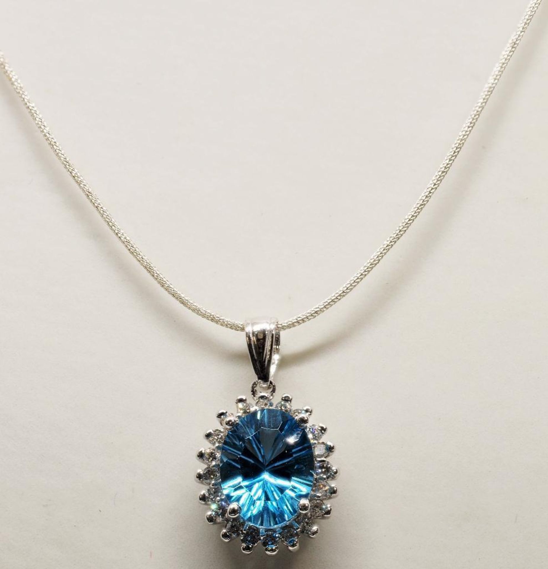 14K White Gold Diamond and Topaz Pendant. Insurance $3566