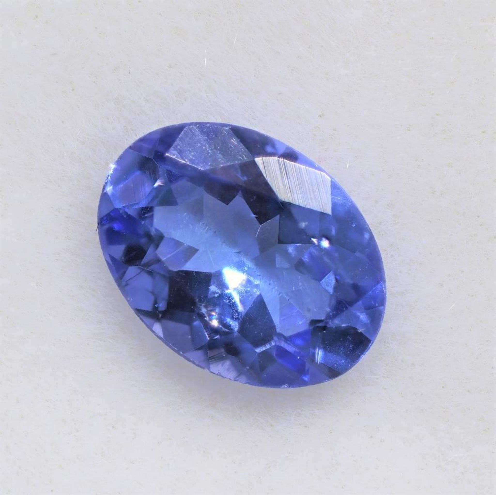 Genuine Tanzanite (App. 7*5, Dec. birth Stone ). Retail $600