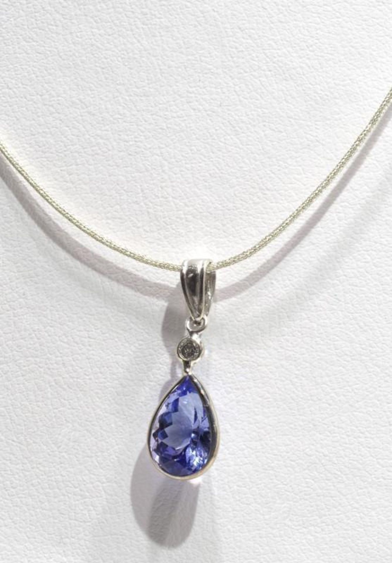 14K White Gold Tanzanite(2.0ct) Diamond (0.06ct) Pendant with Sterling Silver Chain. Insurance Value - Image 2 of 4