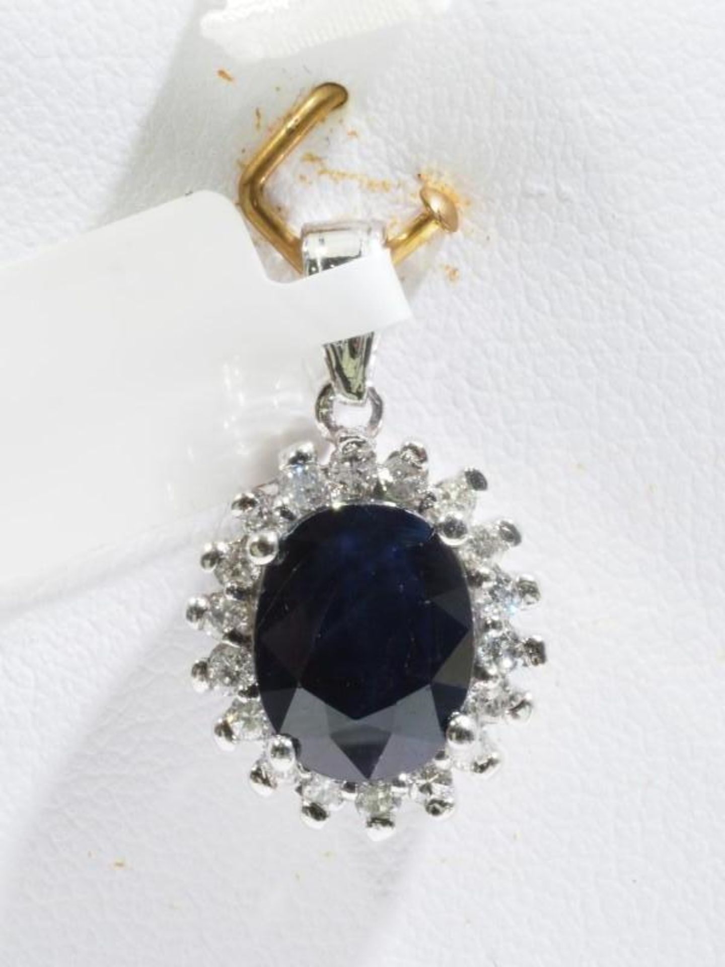 14K Gold Sapphire (2.0ct) and Diamond (0.18ct) Halo Pendant. Retail Value $2400 (68-GC29)