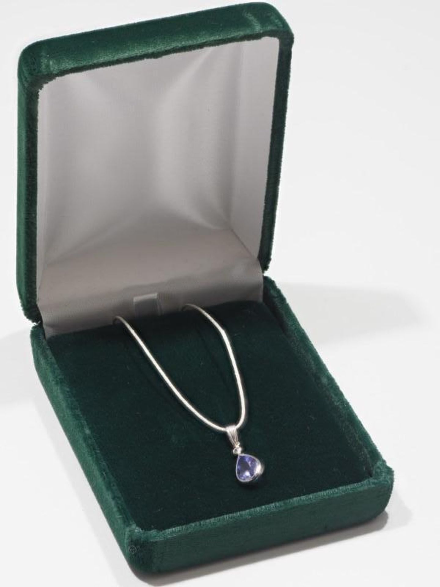 14K White Gold Tanzanite(2.0ct) Diamond (0.06ct) Pendant with Sterling Silver Chain. Insurance Value - Image 3 of 4