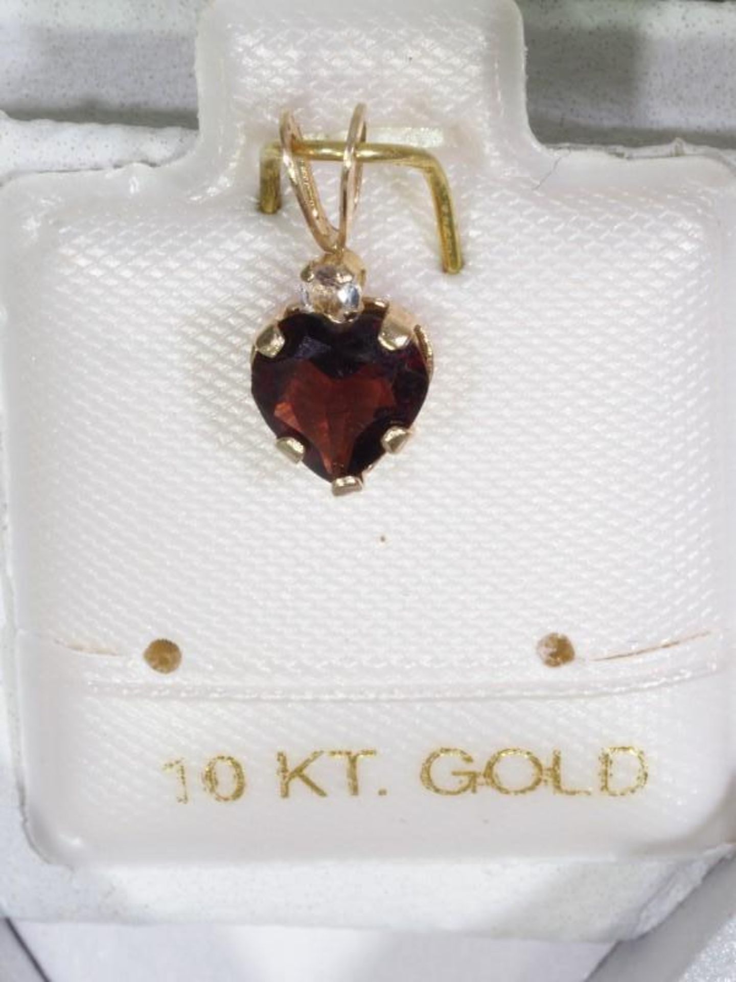10K Gold Genuine Heart Shaped Garnet (January Birthstone) and White Topaz Pendant. Retail $240 (59-G