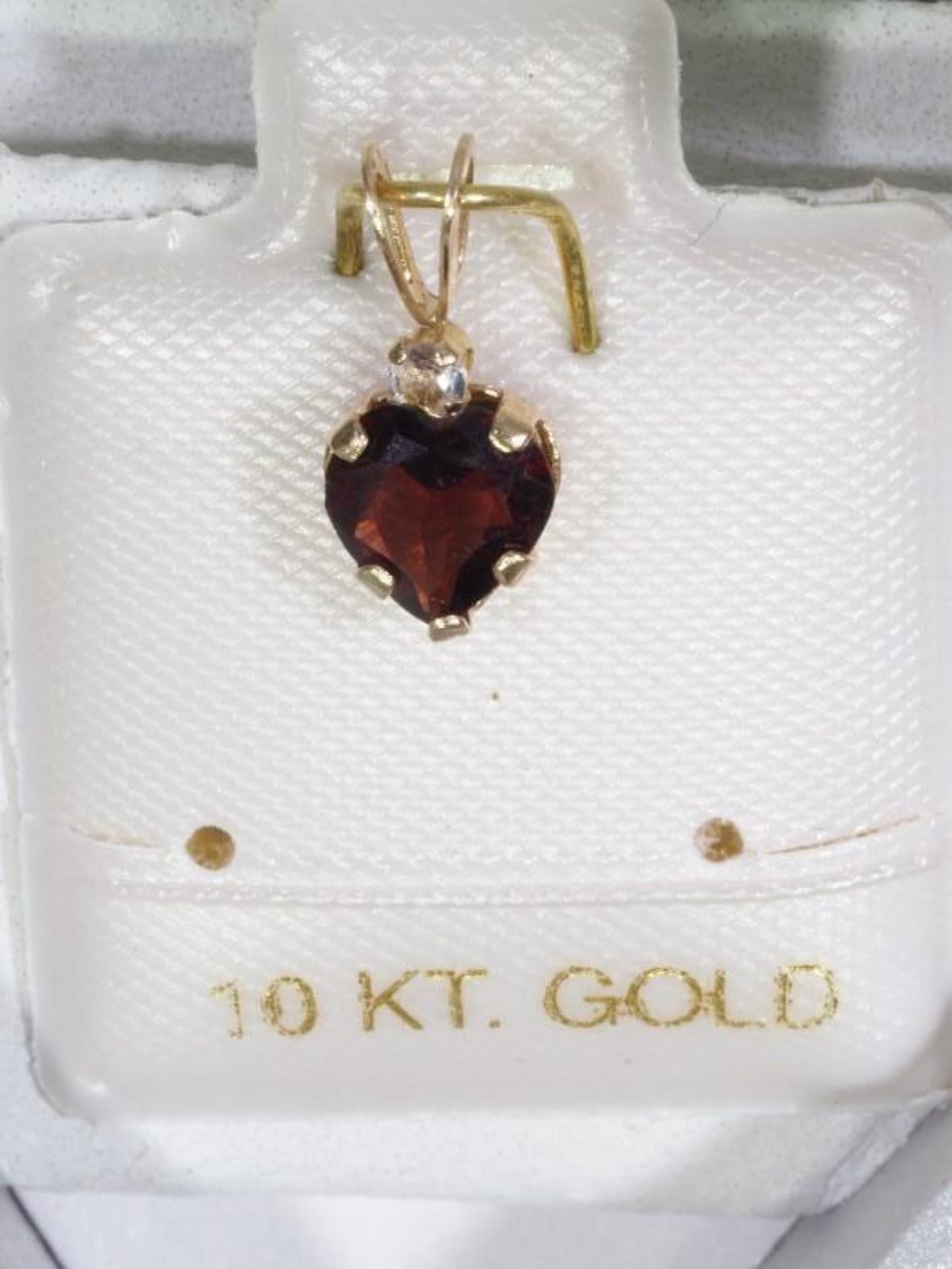 10K Gold Genuine Heart Shaped Garnet (January Birthstone) and White Topaz Pendant. Retail $240