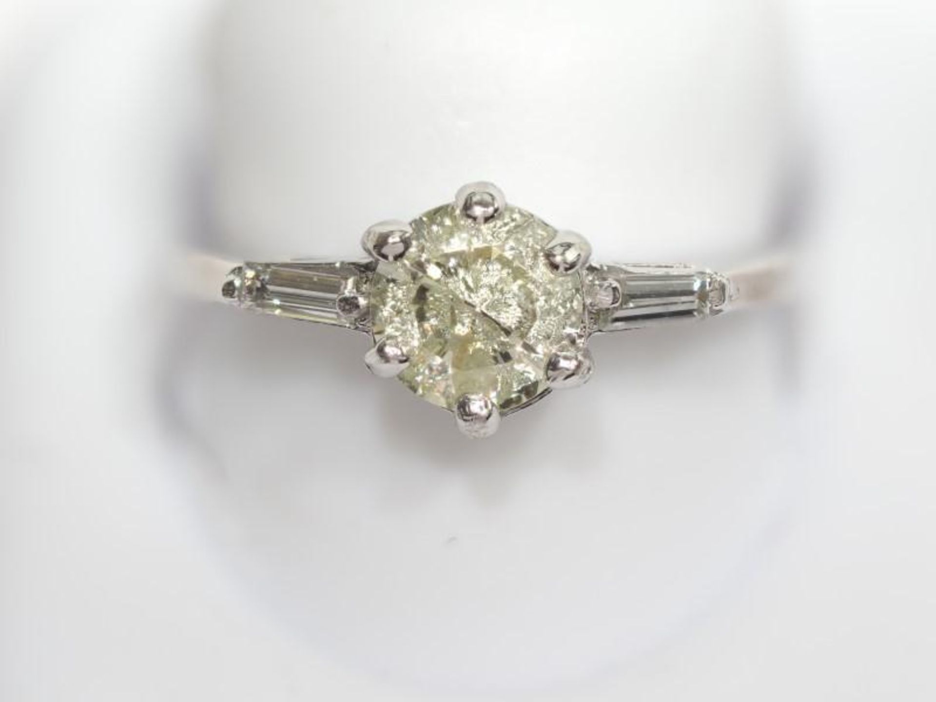 10K White Gold Diamond (1.00ct) with two Tapered Baguette Diamonds (0.08ct) Ring. Insurance Value $1