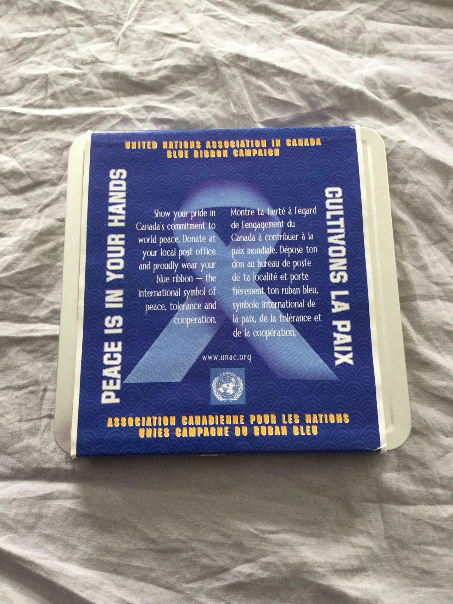 Royal Canadian Mint - 2000 United nations Blue Ribbon Campaign Collectors Stamp and 25 cent coin set