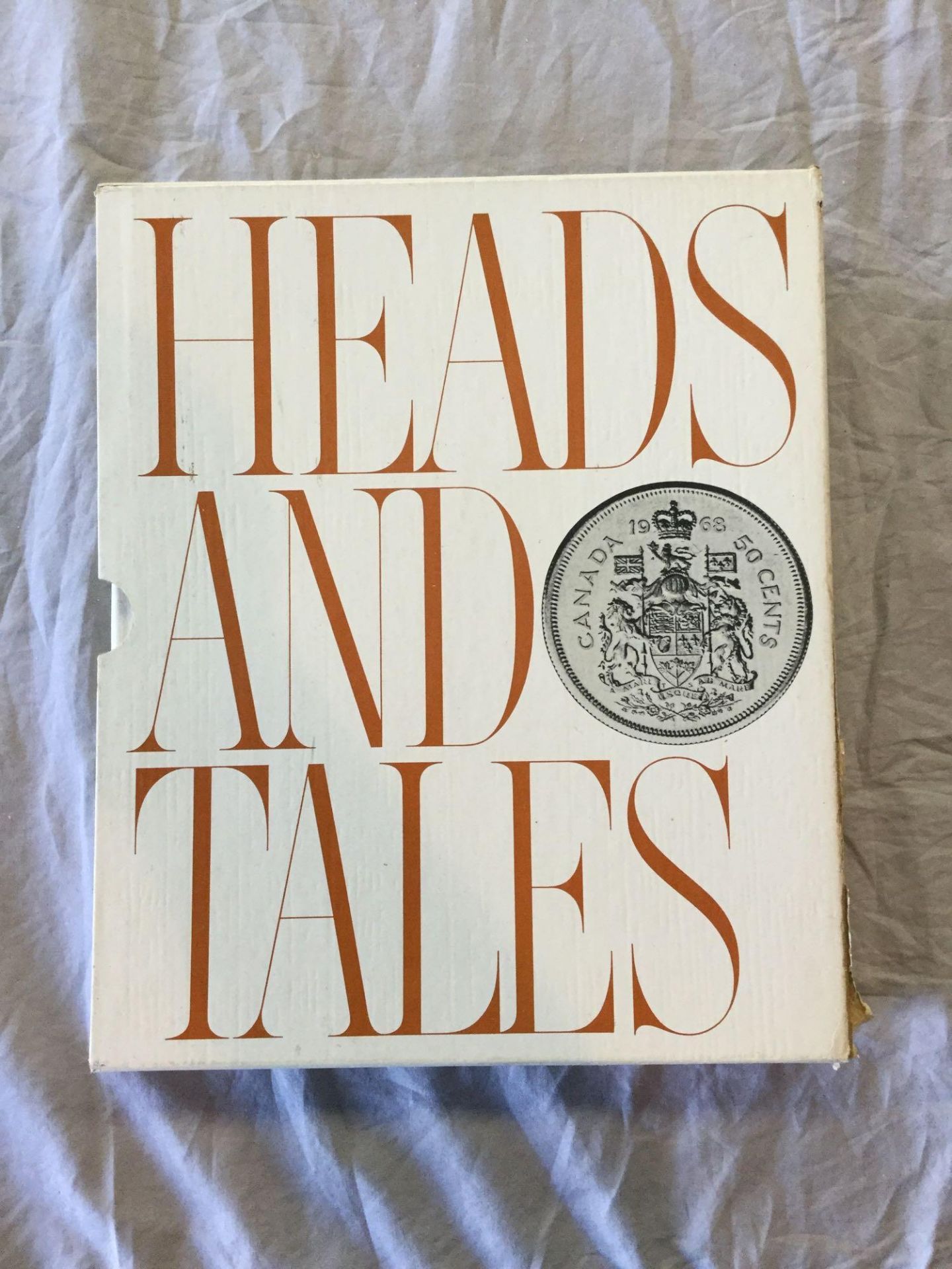 Book - Heads and Tales