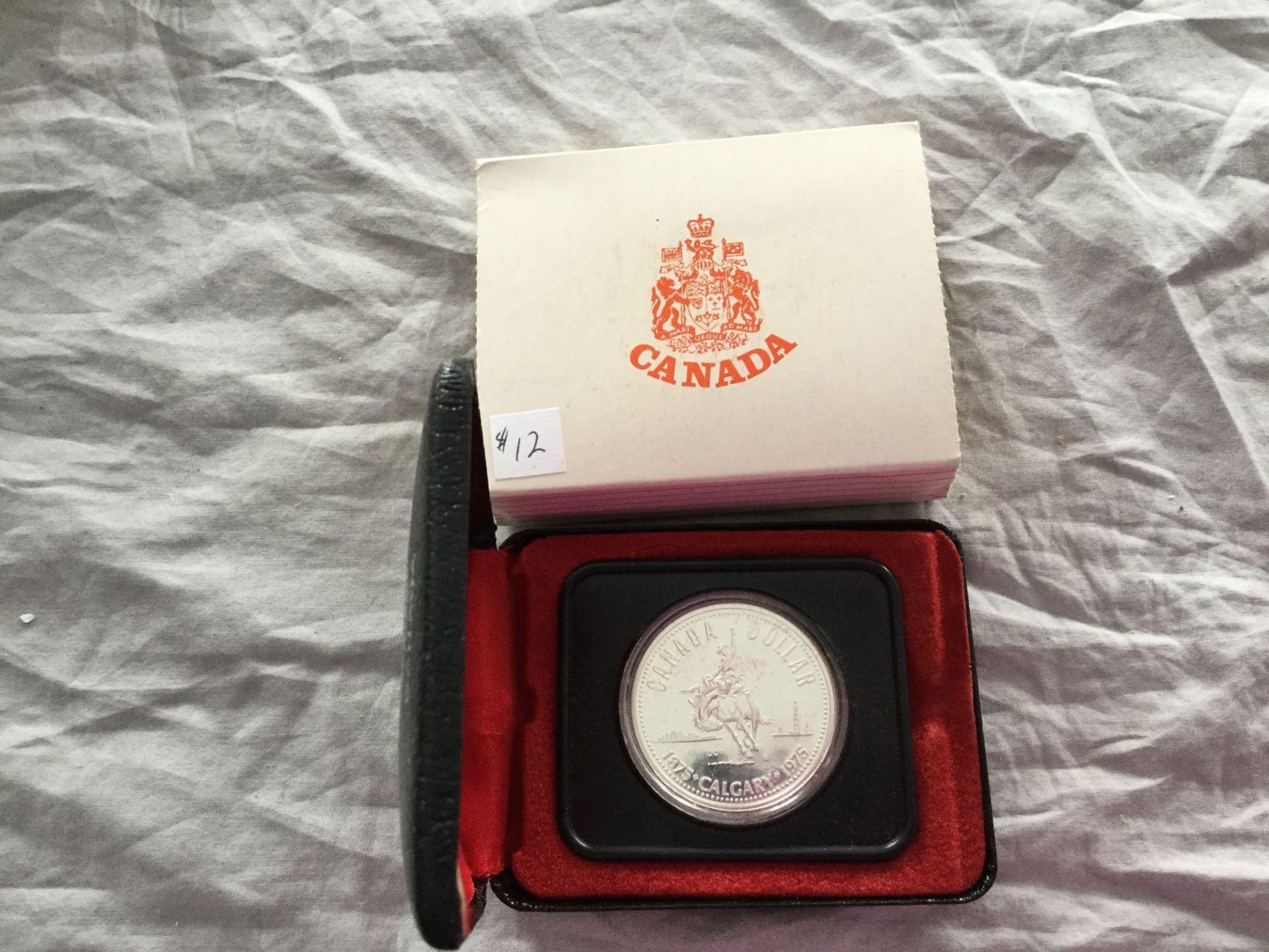 1875-1975 Royal Canadian Mint- Canada Silver Dollar - Calgary Stampede Special Edition